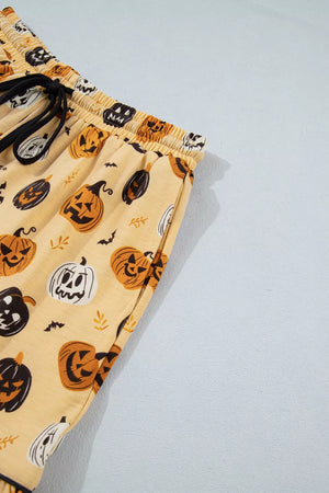 black pajama set with button-front and pumpkin-print