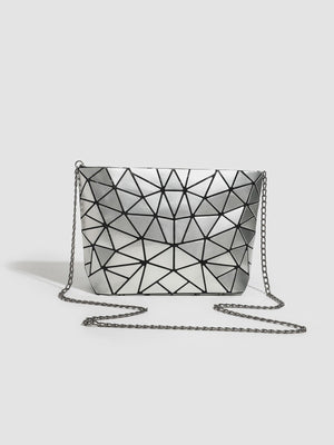 crossbody bag in silver featuring chain strap and boxy fit