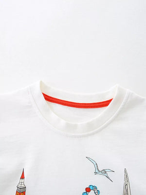White cotton t-shirt with red trim, featuring a graphic print of London landmarks and flying creatures.