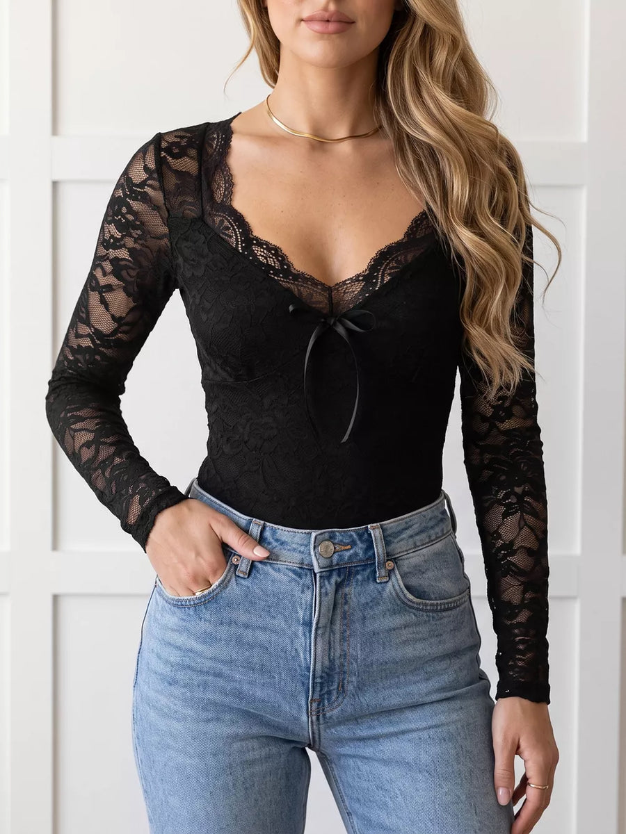 Black lace bodysuit with long sleeves and a tie-front neckline