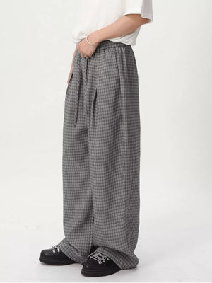 Plaid wide-leg relaxed fit joggers in grey with adjustable drawstring waist.