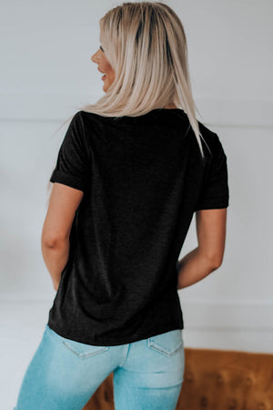 Black t-shirt with short sleeves and a crew neck, featuring a graphic print on the back.