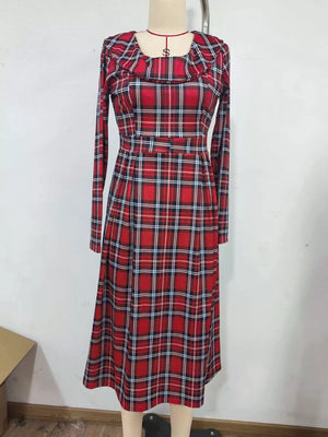 black midi dress featuring zipper and plaid