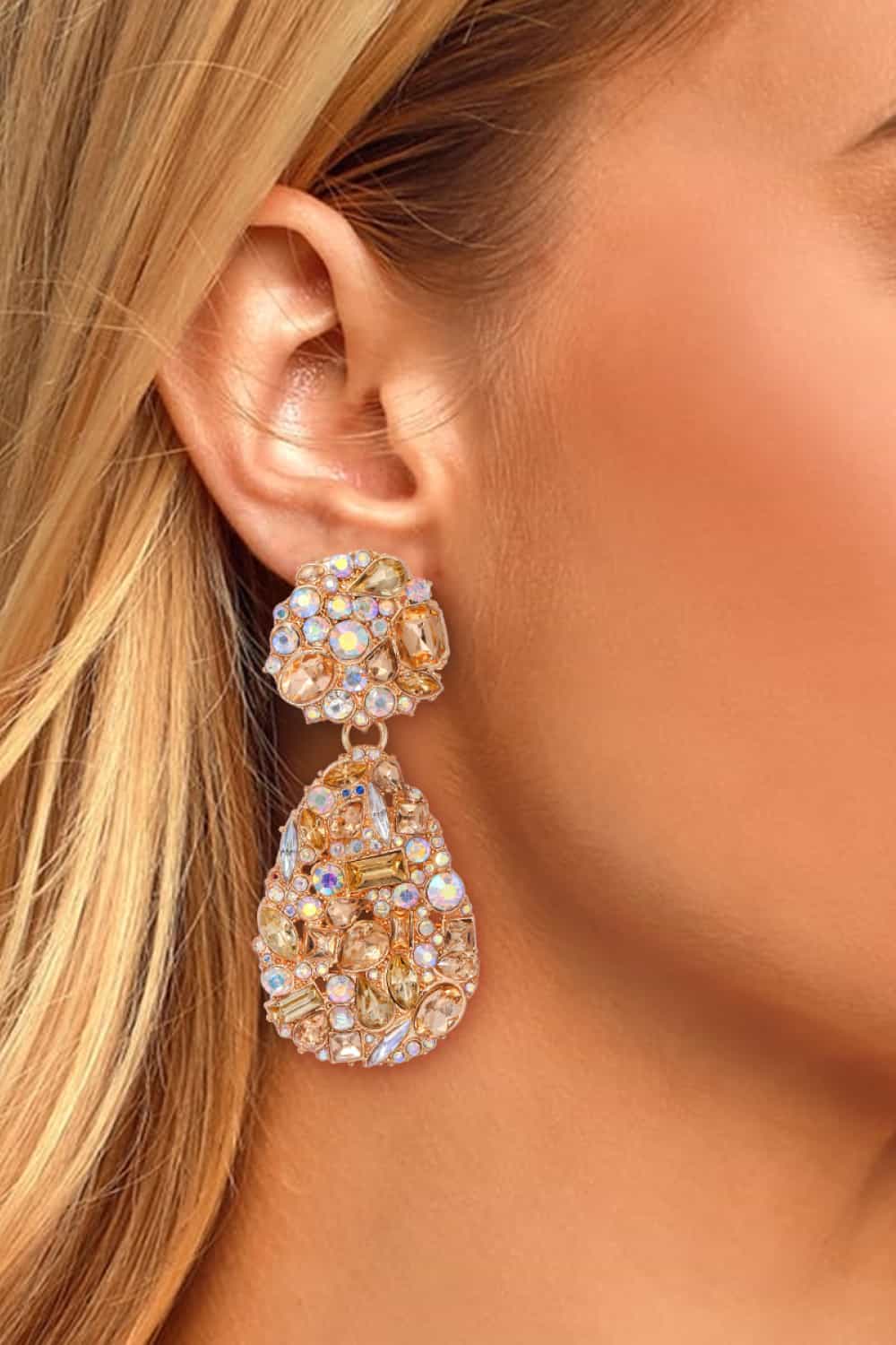 Gemstone cluster drop earrings in apricot with mixed cut stones and alloy settings.