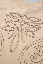 sweatshirt featuring embroidered in Tan with 65% polyester, 35% cotton Care instructions: Machine wash cold texture