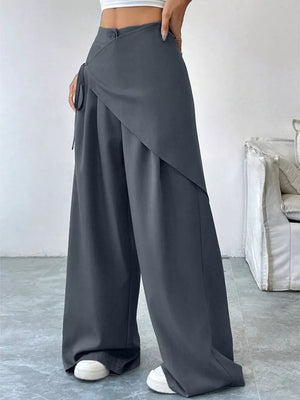 Grey wide-leg wrap pants with a tie detail and button closure.