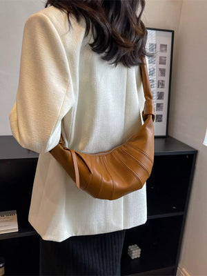 Chic Crescent Hobo Crossbody Bag in brown faux leather with a curved silhouette and stitched details.