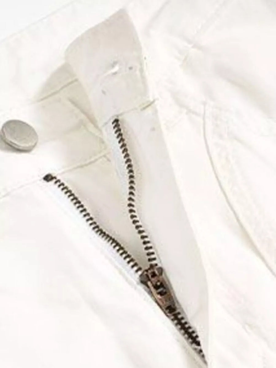 White sweatpants with zipper fly and button closure detail.