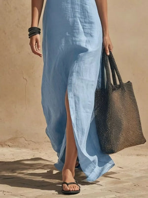 White maxi dress with adjustable straps and spaghetti strap