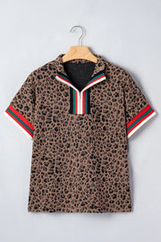 Brown leopard jacquard half-zip shirt with striped collar and sleeve trim.