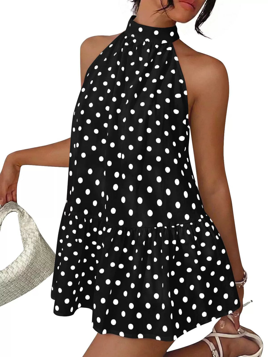 white mini dress featuring tiered and polka dot