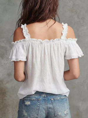 White ruffled cold shoulder shirt with short sleeves and a deep V-neck.
