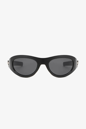 Black sporty shield sunglasses with a bow accent and dark lenses.