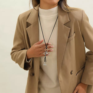 Silver with Elegant Bow Pendant Faux Leather Necklace in Silver