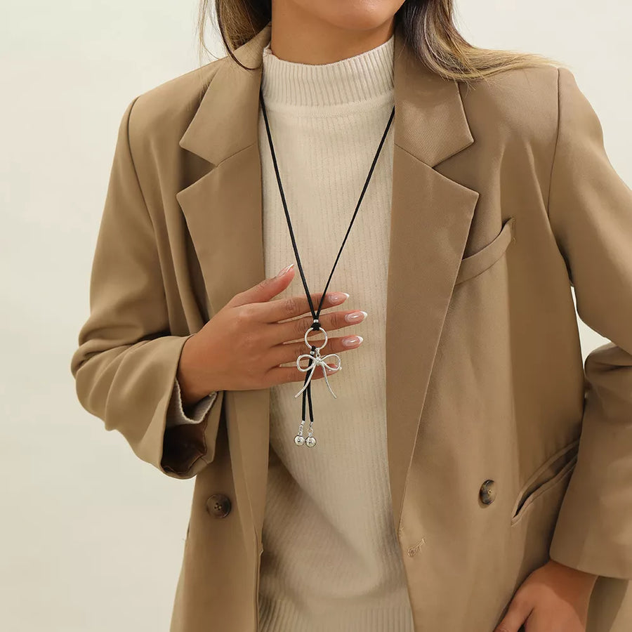Silver with Elegant Bow Pendant Faux Leather Necklace in Silver