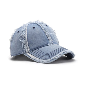 Light wash denim baseball cap with frayed edges and distressed details.