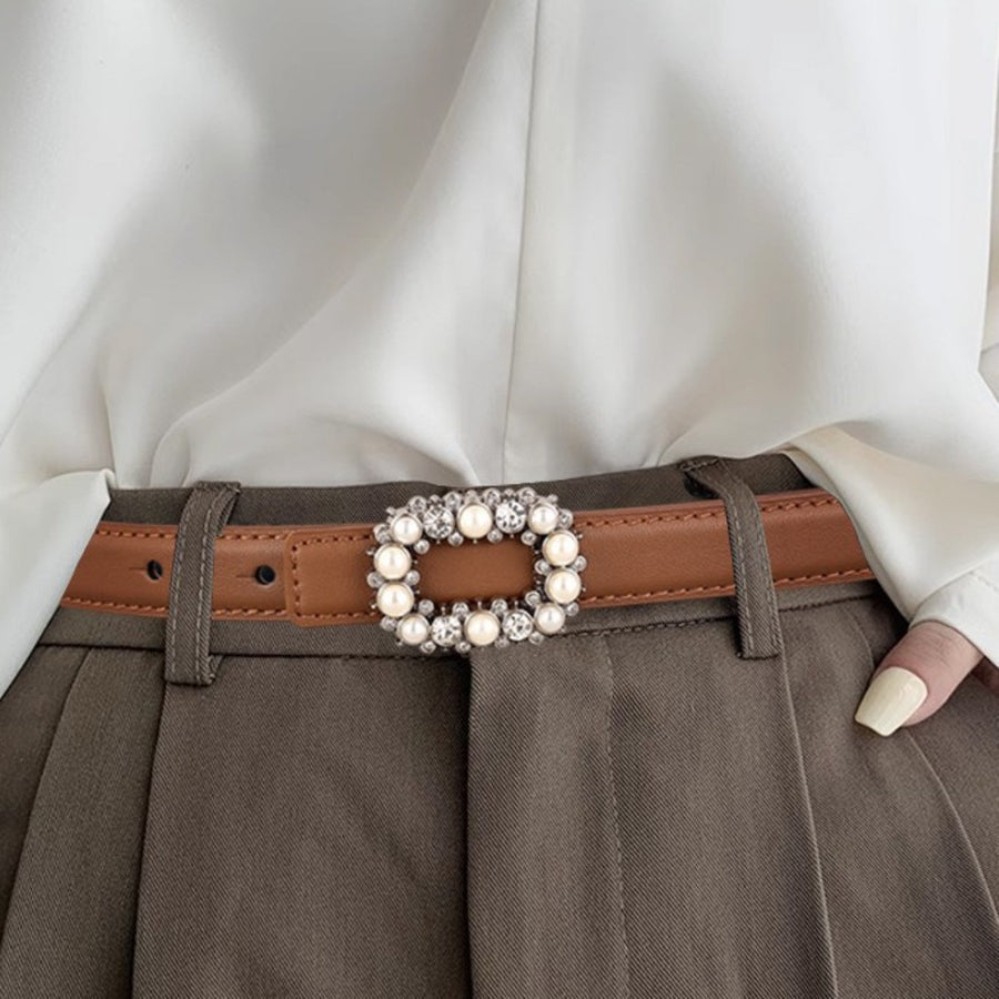 Brown leather belt with pearl and rhinestone buckle detail
