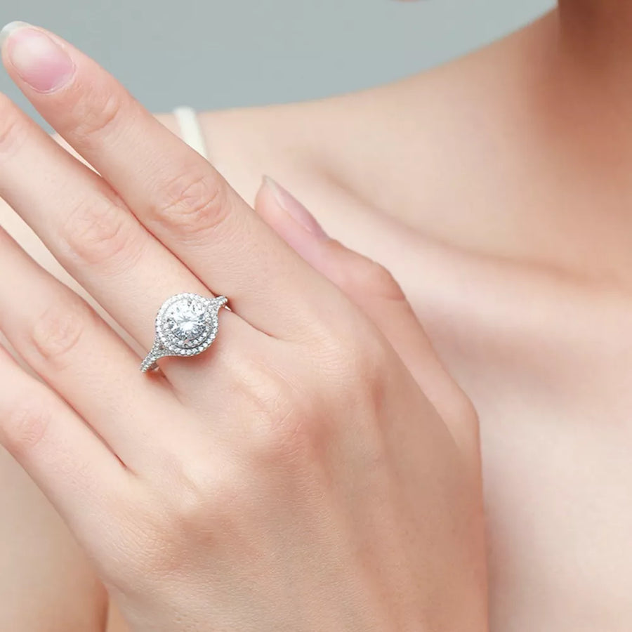 925 sterling silver,Moissanite Carat weight: 1ct Care instructions: Avoid wearin ring in Silver with round halo silhouette