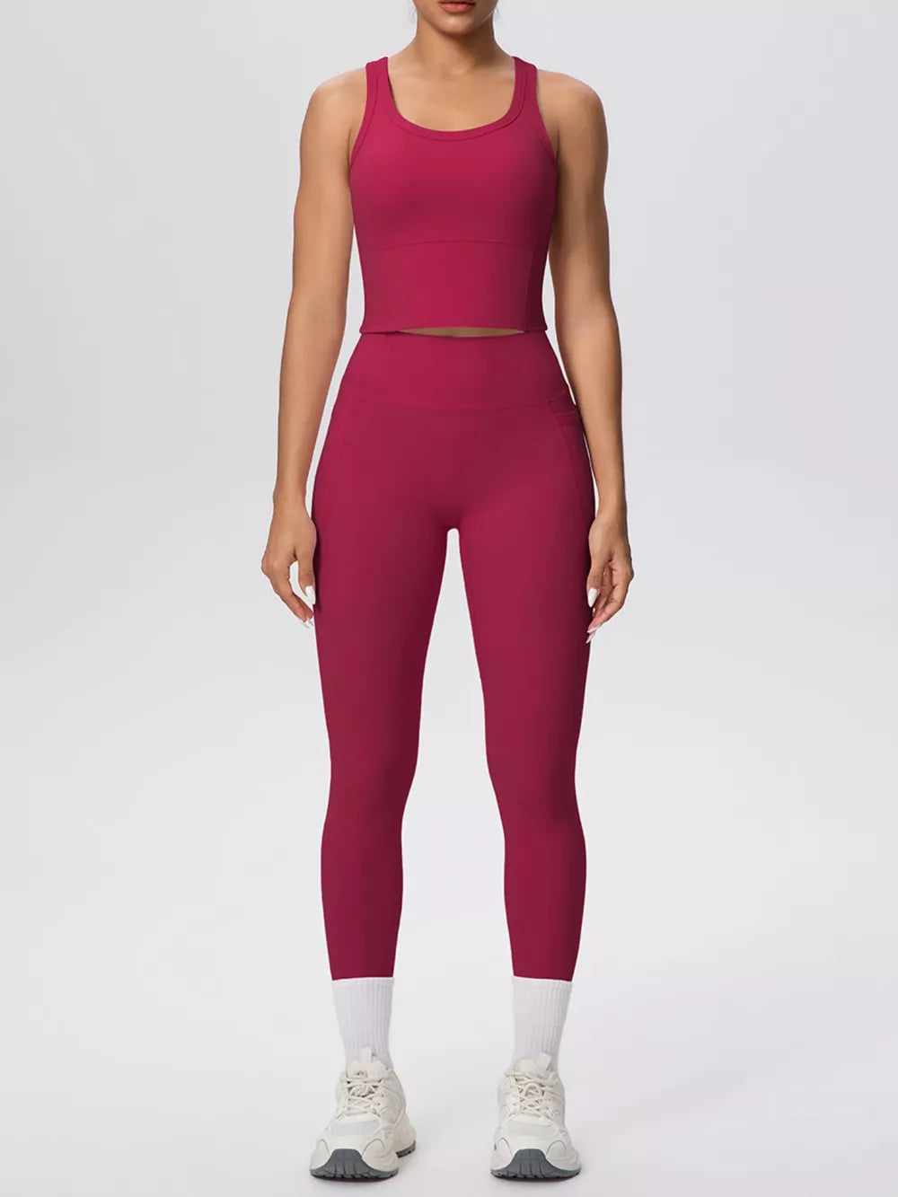 80% nylon, 20% spandex Care instructions: Machine wash cold athletic tank in Cerise with fitted silhouette