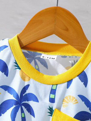 Baby tee with yellow trim and tropical palm tree print, made of cotton.