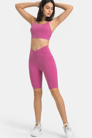 V-waist biker shorts in Hot Pink with side pockets.