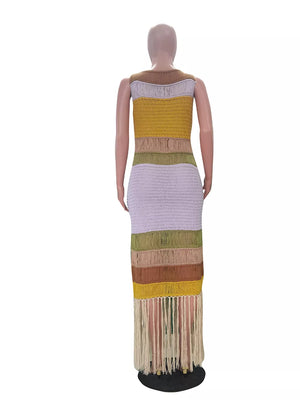 Maxi knit dress with color block stripes and fringe detail, sleeveless with a round neck.