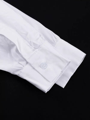 White cotton dress shirt with button cuff and long sleeves.