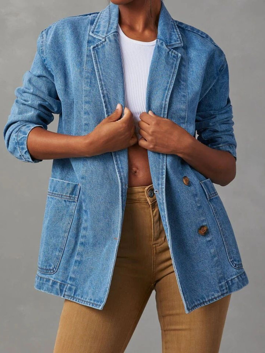 blazer in light blue featuring buttoned and relaxed fit