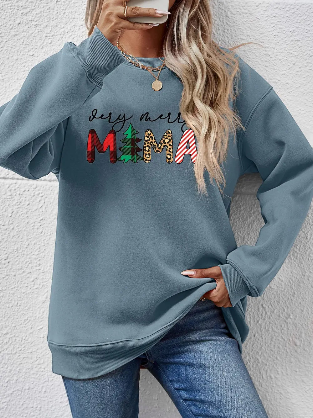 French Blue long sleeve sweater with abstract graphic print and crew neck.