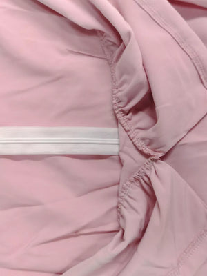 Pink midi dress with elastic waistband and ruffled detail