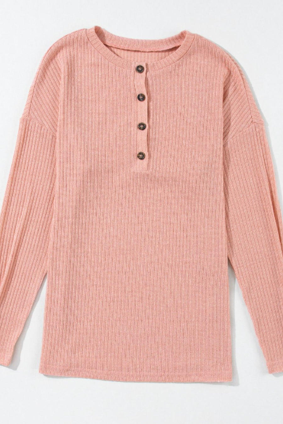 Dusty pink ribbed henley knit top with button detail and relaxed fit.