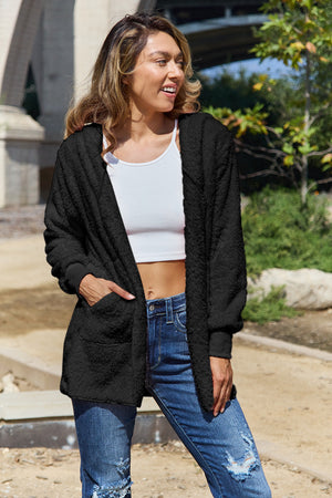Black plush hooded cardigan jacket with pockets and ribbed cuffs.