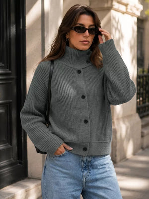 cardigan in charcoal featuring buttoned and relaxed fit