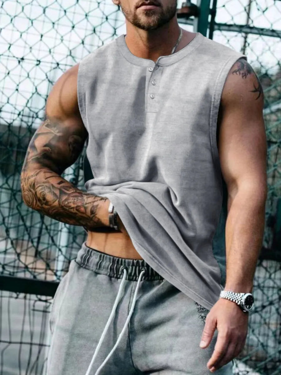 Sleeveless gray henley muscle tank top with button detail.