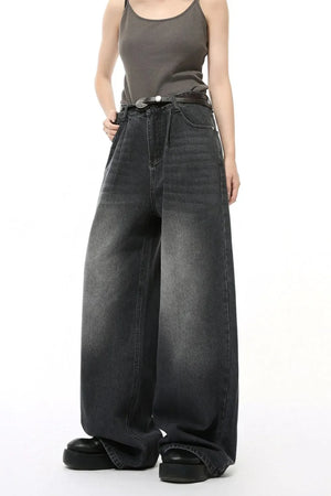 Oversized black denim palazzo jeans with subtle wash and wide leg