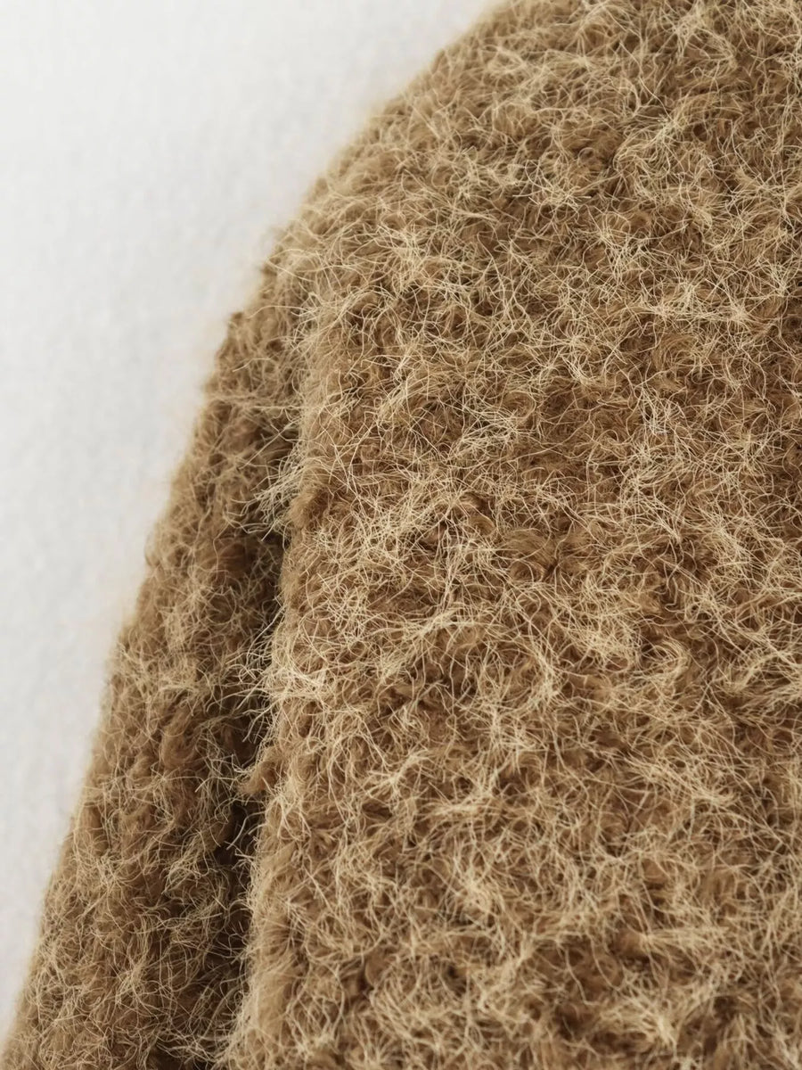 Textured knit tie-front coat in dark brown with fuzzy, shaggy material detail.