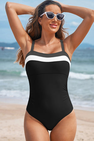 one-piece swimsuit featuring color-block in black with 82% polyamide, 18% elastane Care instructions: Machine wash cold