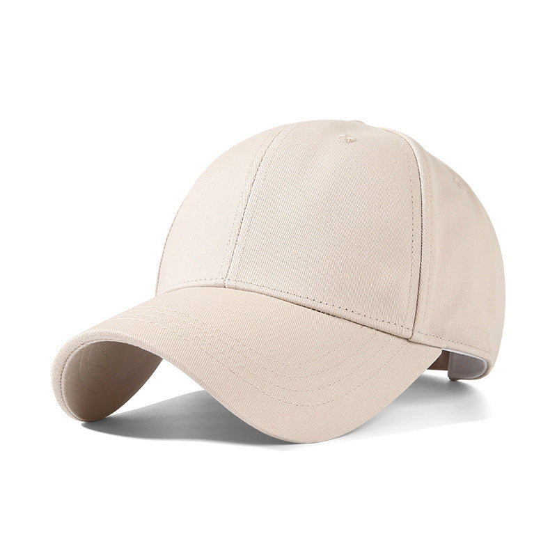 Beige cotton baseball cap with curved brim and stitched detailing