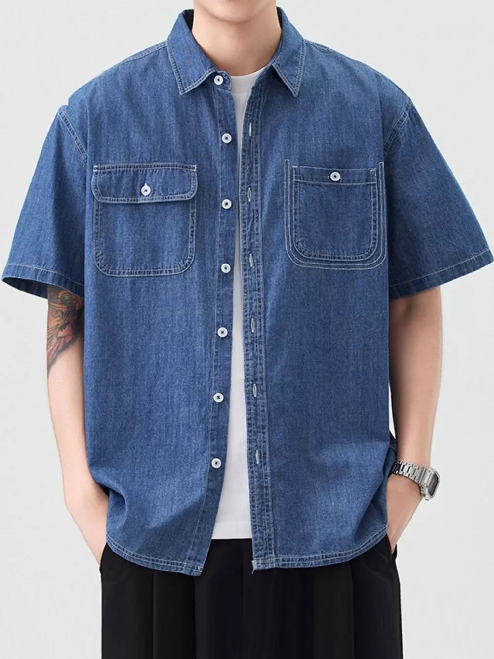 Essential Plus Size Denim Button-up Shirt in Dark Blue, 100% cotton, short sleeve, with two chest pockets.