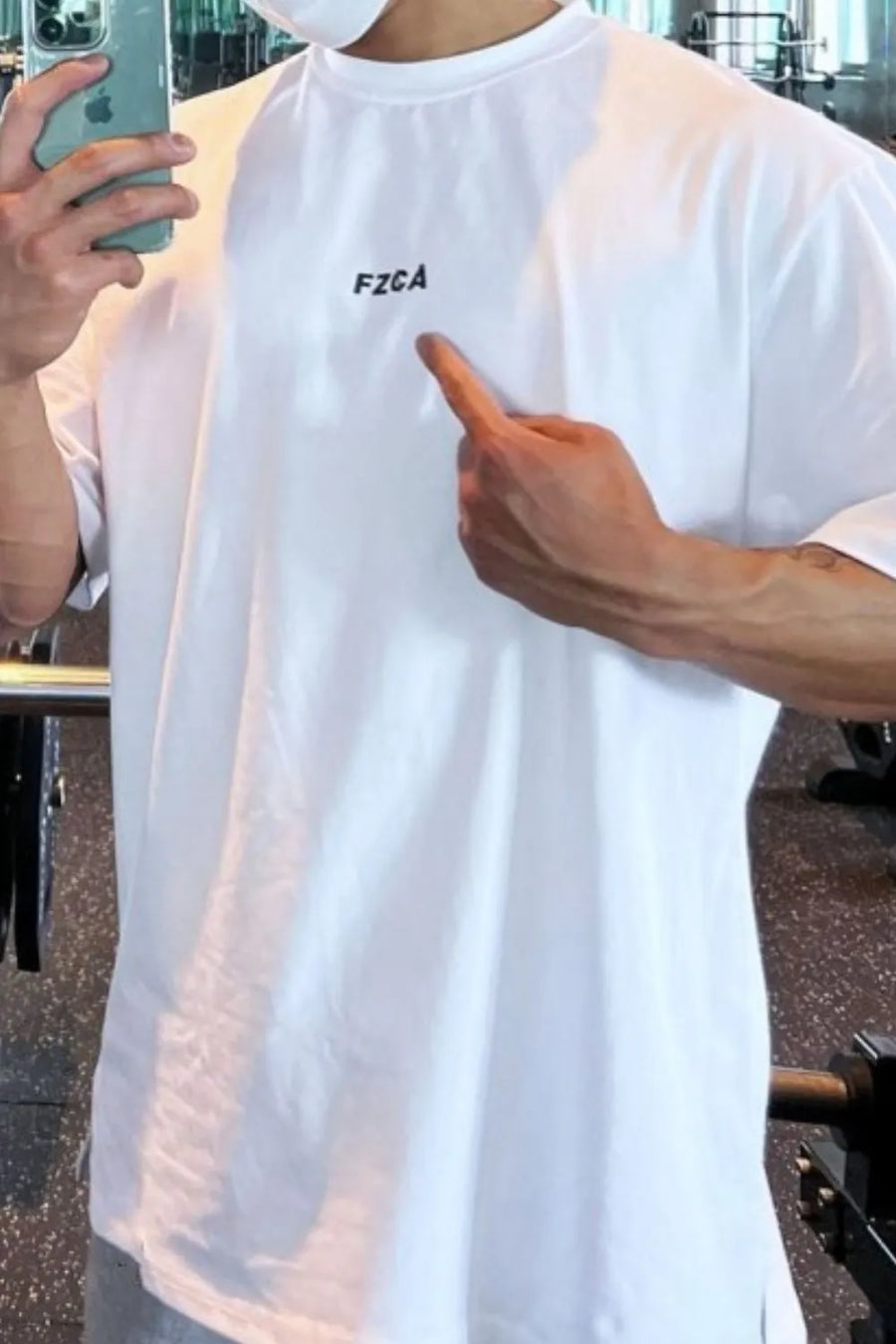 Oversized white t-shirt with drop shoulder and black FZCA logo detail