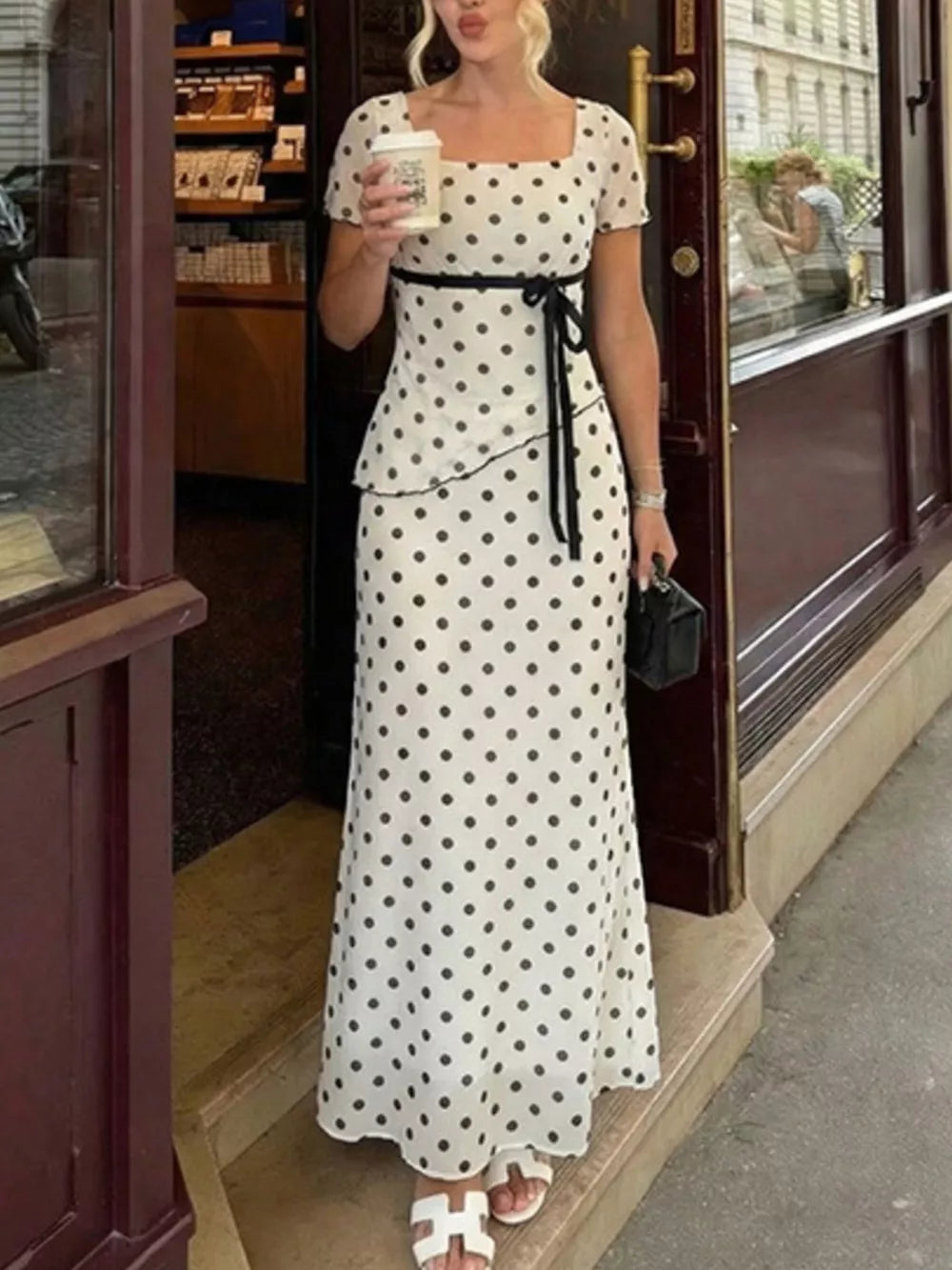 Polka dot square neck top and maxi skirt set in black and ivory with a black ribbon tie waist.