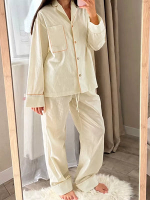 100% polyester Care instructions: Machine wash cold pajama set in Cream with relaxed silhouette