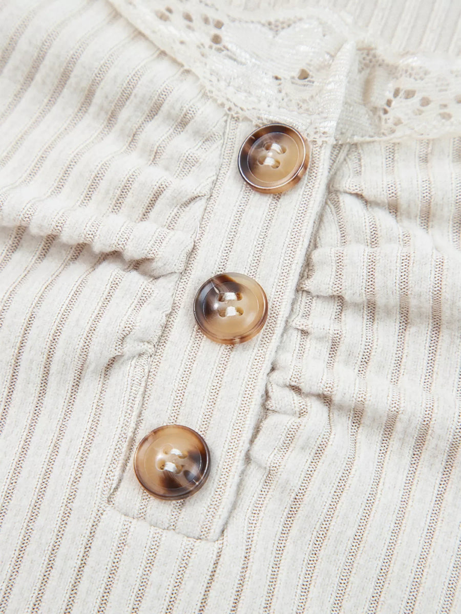 Beige ribbed long-sleeve top with lace collar and button detail
