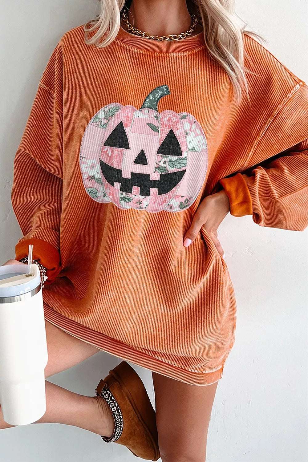 rust sweatshirt with graphic and crew neck