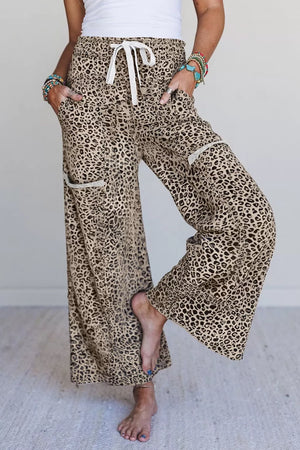 wide-leg pants in tan featuring pocketed and flared fit