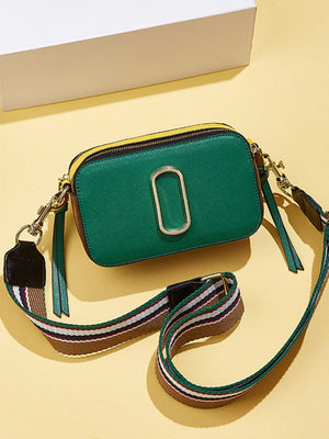 dark green crossbody bag with flap and color-block