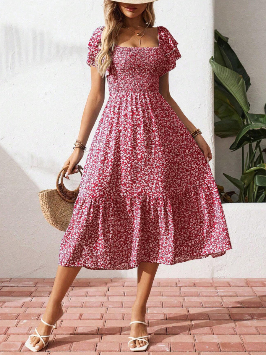 Red floral smocked ruffle sleeve midi dress with tiered skirt.