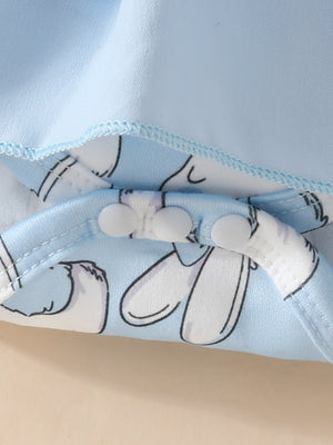 Sky blue baby dress with bunny print and snap closures.