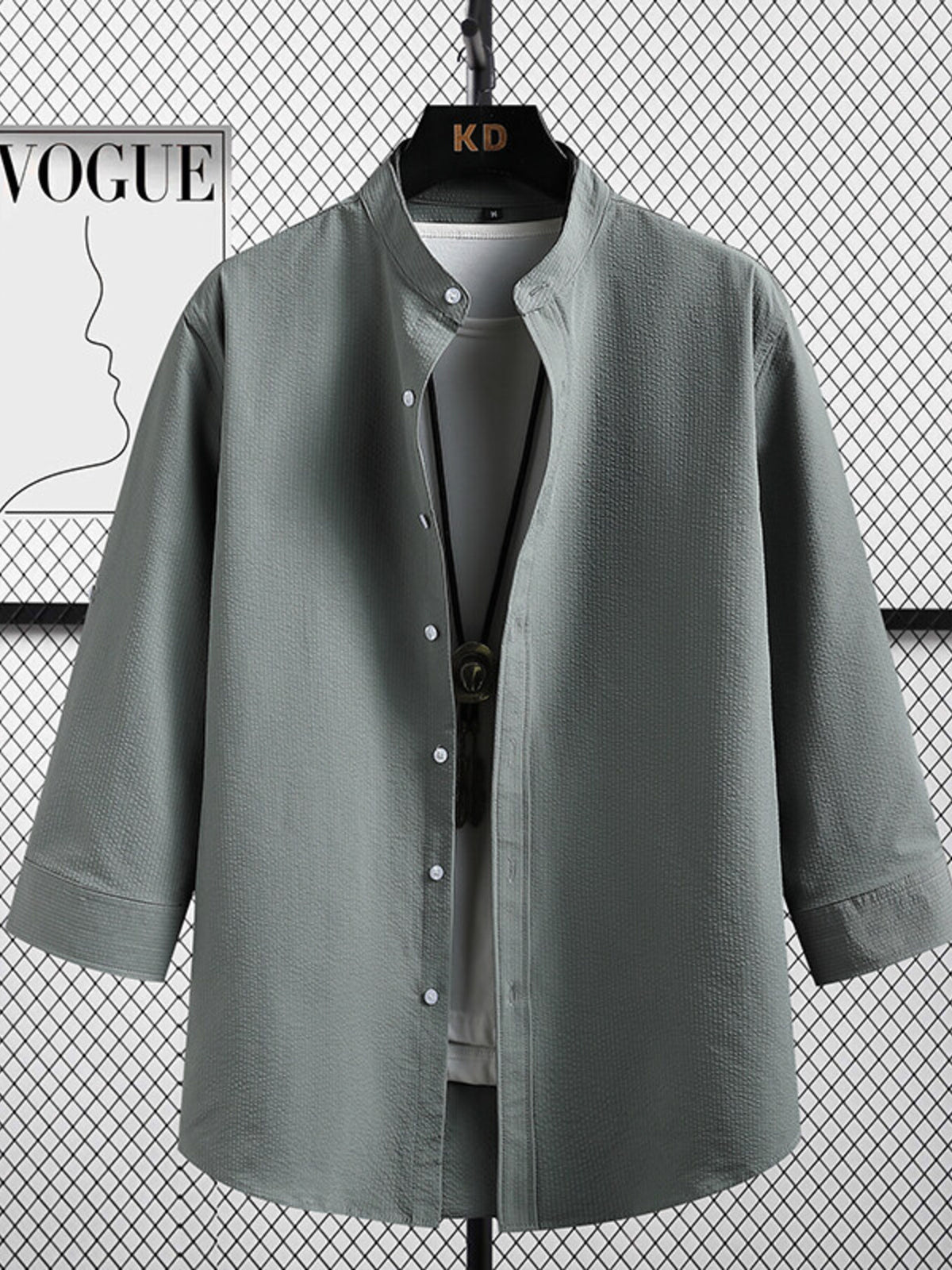 Men's grey textured band collar shirt with white buttons and 3/4 sleeves
