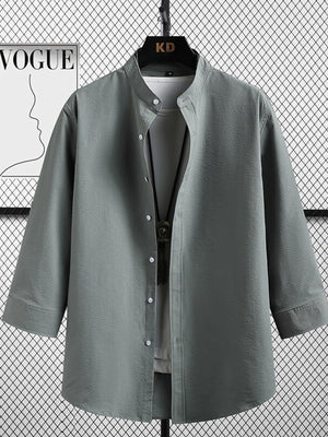 Men's grey textured band collar shirt with white buttons and 3/4 sleeves